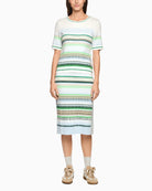 Woman wearing Marc Cain striped knit pullover full outfit – Áines Boutique