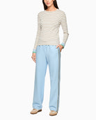 Woman wearing Marc Cain striped shirt full outfit – Áines Boutique