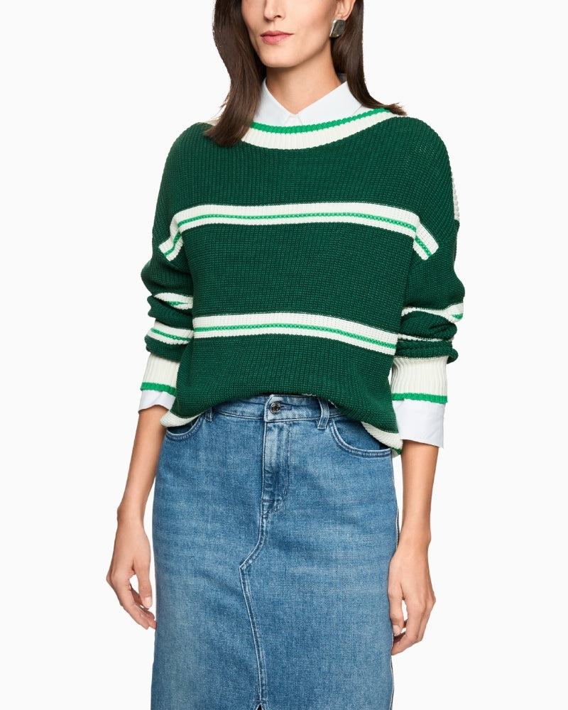 Woman wearing Marc Cain green sweater with white stripes – Áines Boutique