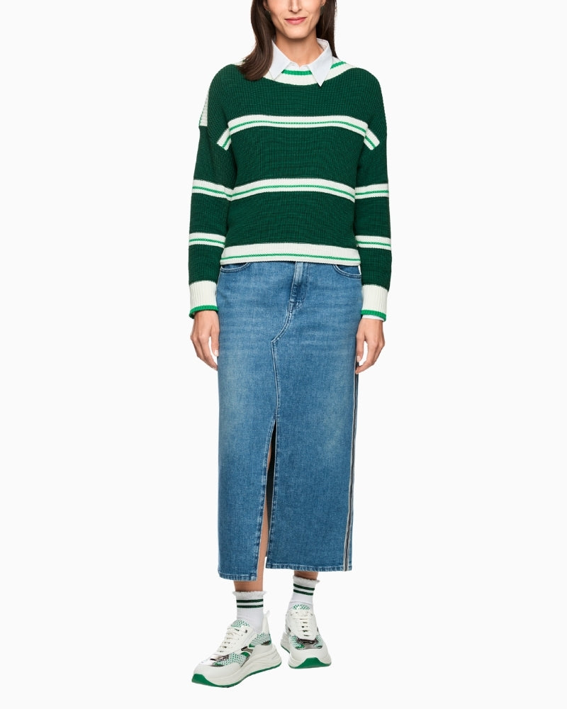 Woman wearing Marc Cain green sweater with white stripes – Áines Boutique
