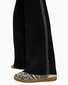 Close-up of elasticated waistband with drawstring on Marc Cain trousers