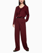Front view of Marc Cain WICHITA wide-leg trousers with high waist and creases