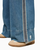 Marc Cain denim trousers fabric texture and side stripe detail – Áines Boutique