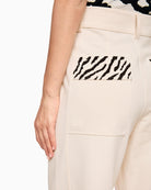 Close-up of waistband and belt loops on WOKHA culottes in cream
