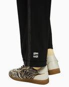 Close-up of elasticated waistband and breathable stretch fabric