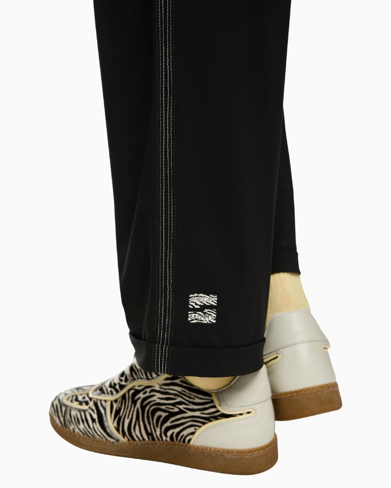 Close-up of elasticated waistband and breathable stretch fabric