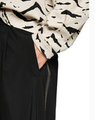 Close-up of elasticated waistband and breathable stretch fabric