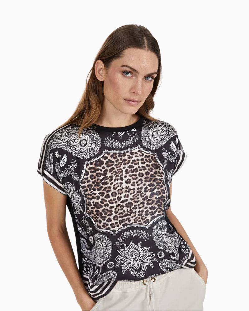 Close-up of scarf print and pleated shoulder detail on Marc Aurel top