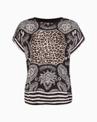Front lay view of satin blouse with jersey back and round neckline