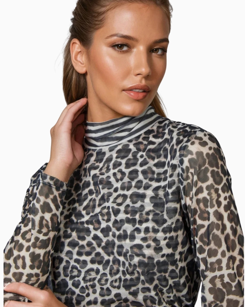 Close-up of layered mesh fabric detailing at neckline