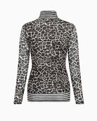 Back view of slim-fit mesh top with turtleneck and mixed prints