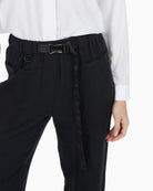 Close-up of snap-buckle belt and patch pockets