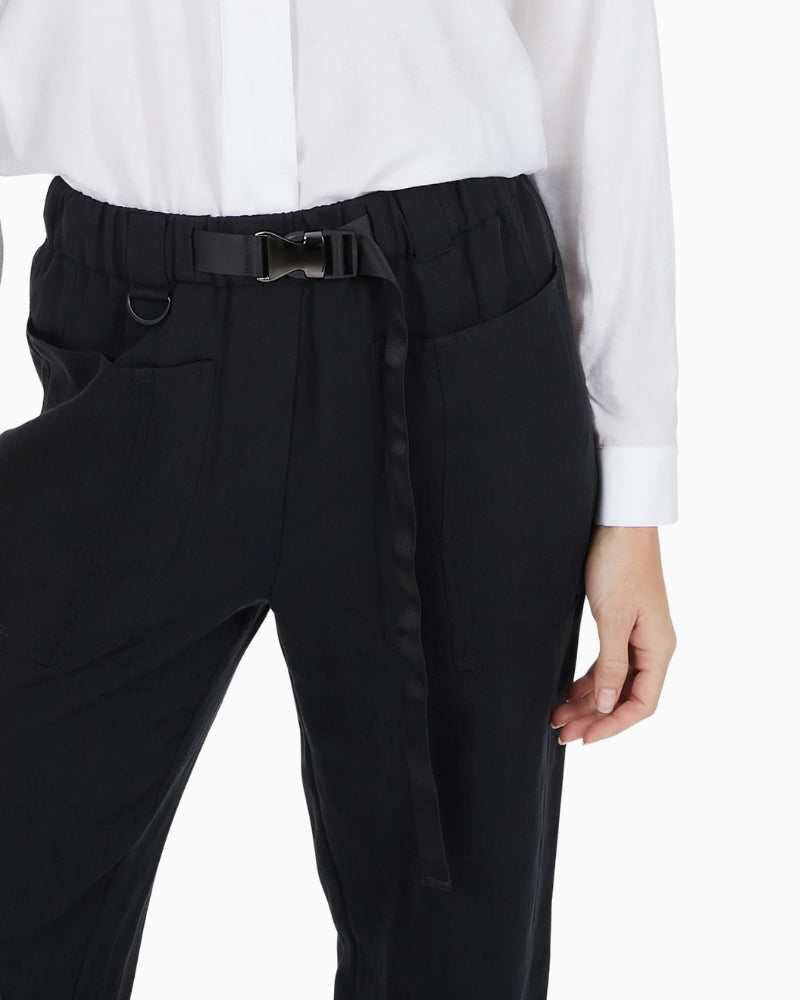 Close-up of snap-buckle belt and patch pockets