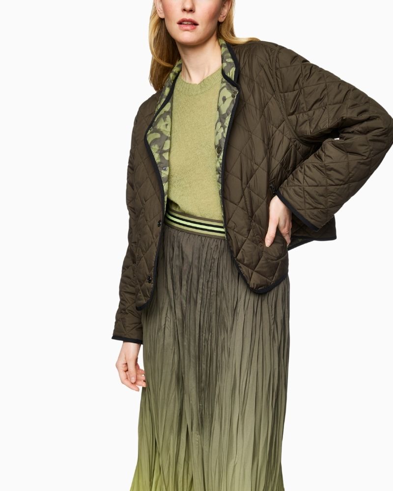 Reversible quilted jacket by Marc Cain in olive with leopard print side