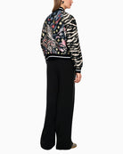 Marc Cain blouson jacket with comic print black back view on woman wearing it – Áines Boutique