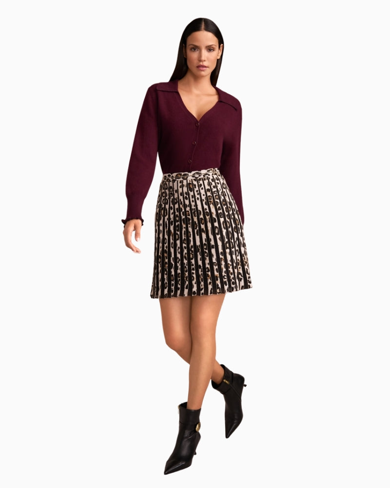 Model wearing cropped cashmere knit with leopard skit