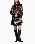 Feminine silk blouse with soft drape and stretch finish
