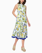 Marc Cain Lemon and Olive Print Viscose Dress in white angled model view