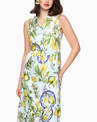 Marc Cain Lemon and Olive Print Viscose Dress in white angled model view pocket