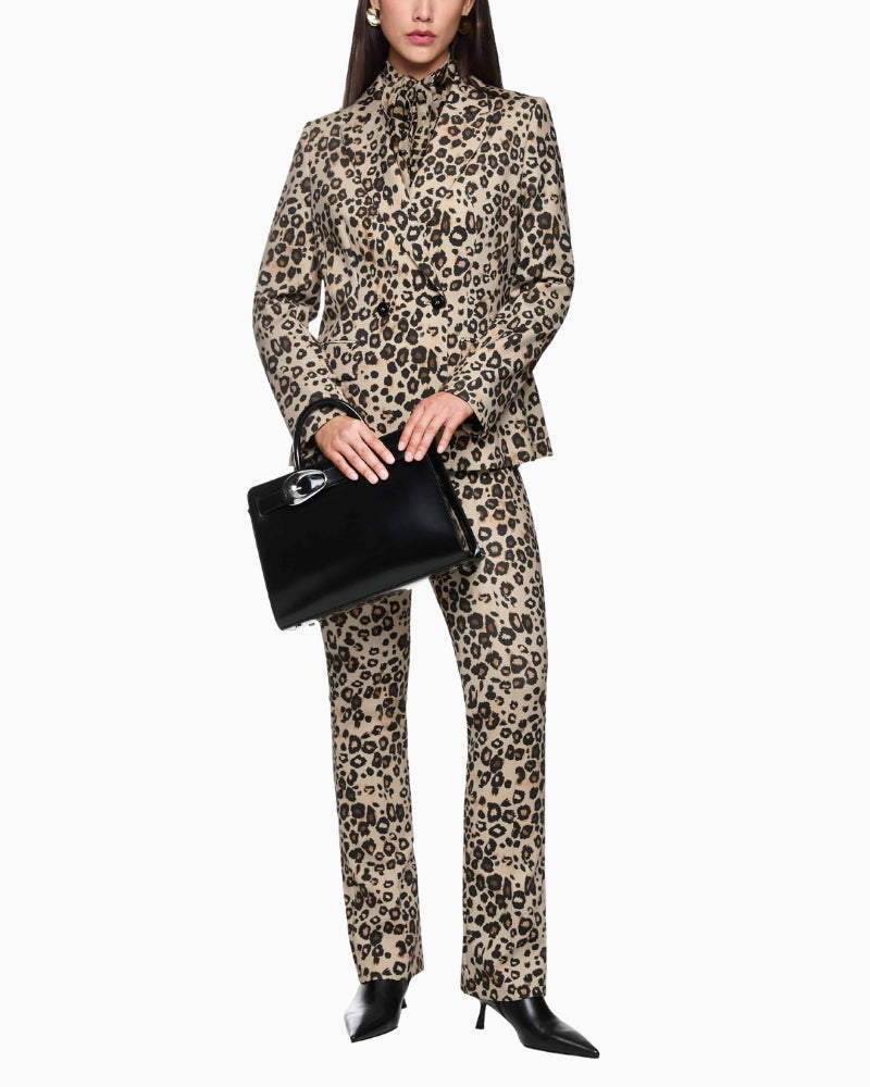 Front view of the Marc Cain leopard print blazer on model, showing double-breasted front and lapels