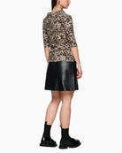 Back view of straight-cut leopard print top