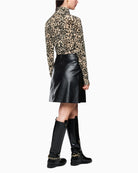 Side view of Marc Cain velour leopard top showing close fit and long sleeves