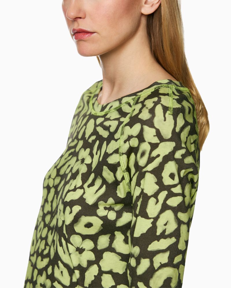 Close-up of lime animal print jersey fabric