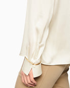 Marc Cain Luxurious Silk Blouse in off-white split cuff detail