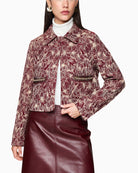 Front view of Marc Cain short embroidered jacket in bright maroon cotton blend