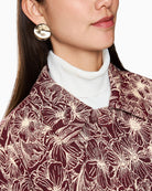 Detail shot of collar and hidden button fastening