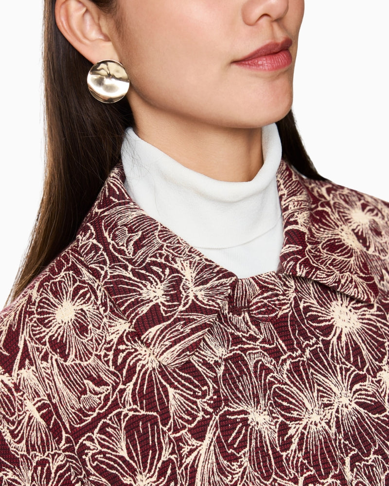 Detail shot of collar and hidden button fastening