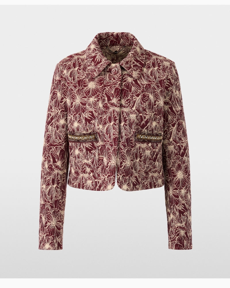 Front view of embroidered jacket showing light, unlined fabric