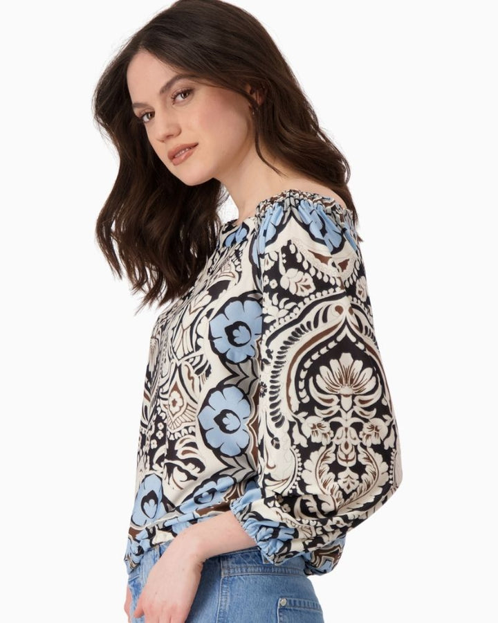 Side view of Monari blouse showing ¾ raglan sleeves and relaxed fit
