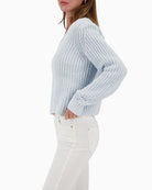 Side view of Monari jumper showing relaxed drape and fit
