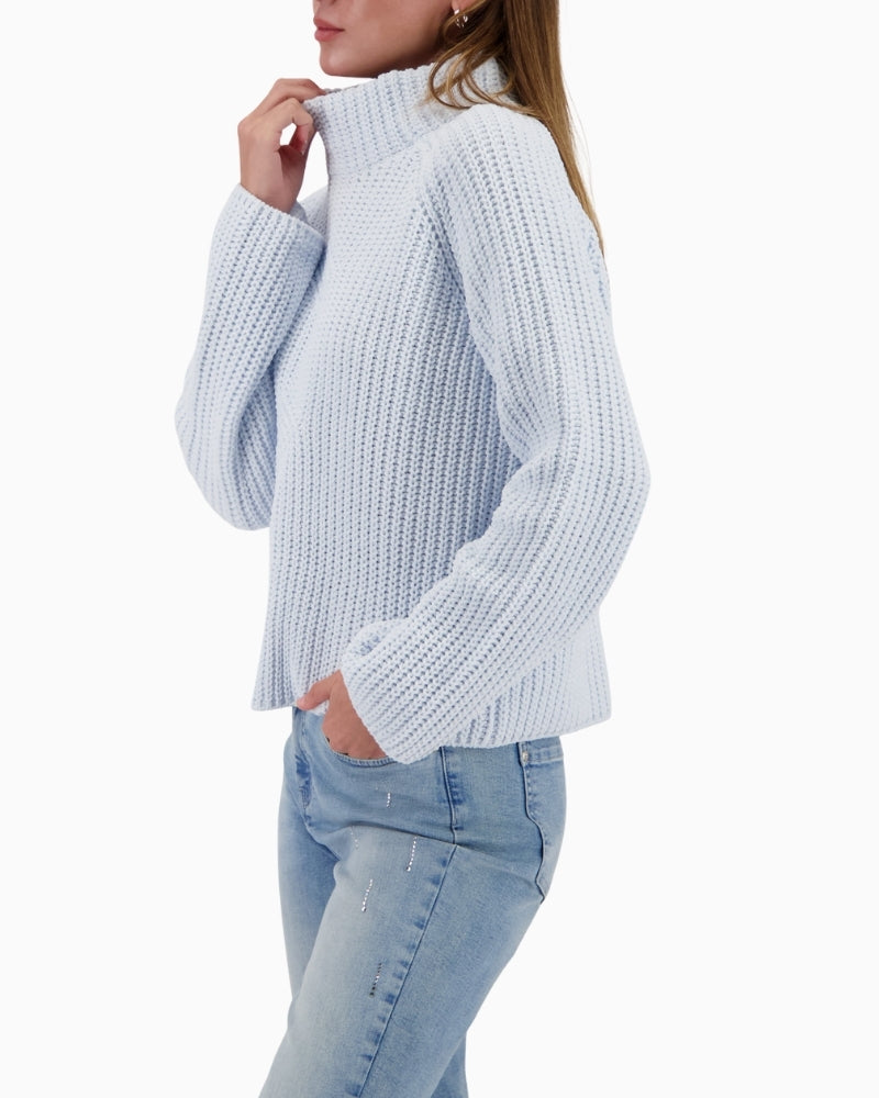 Side view of chenille sweater showing soft drape and texture