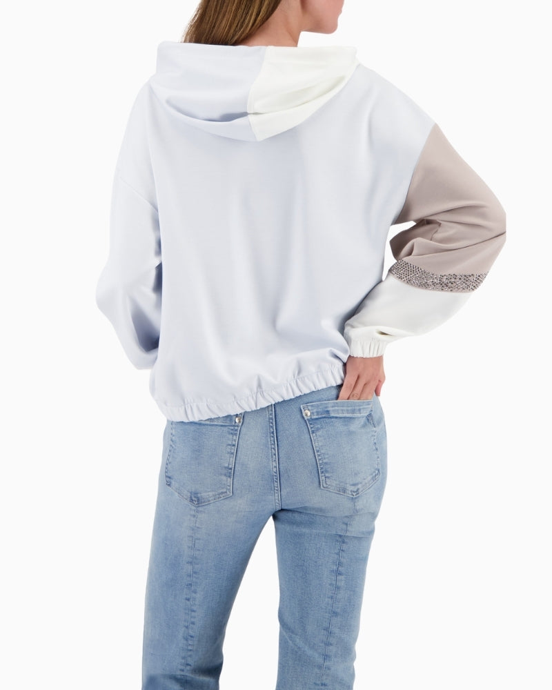 Back view of colourblock hoodie in off-white with long sleeves