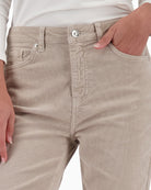 Close-up of corduroy fabric and stitching detail