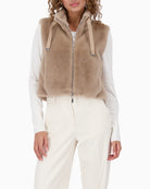 Sleeveless faux fur vest by Monari with stand-up collar and soft fluffy texture