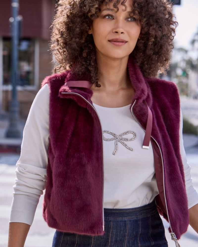 Close-up of plush faux fur texture on Monari taupe vest with zip detail