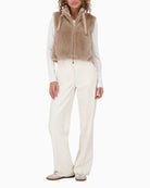 Cosy sleeveless jacket by Monari with soft faux fur finish and practical side pockets