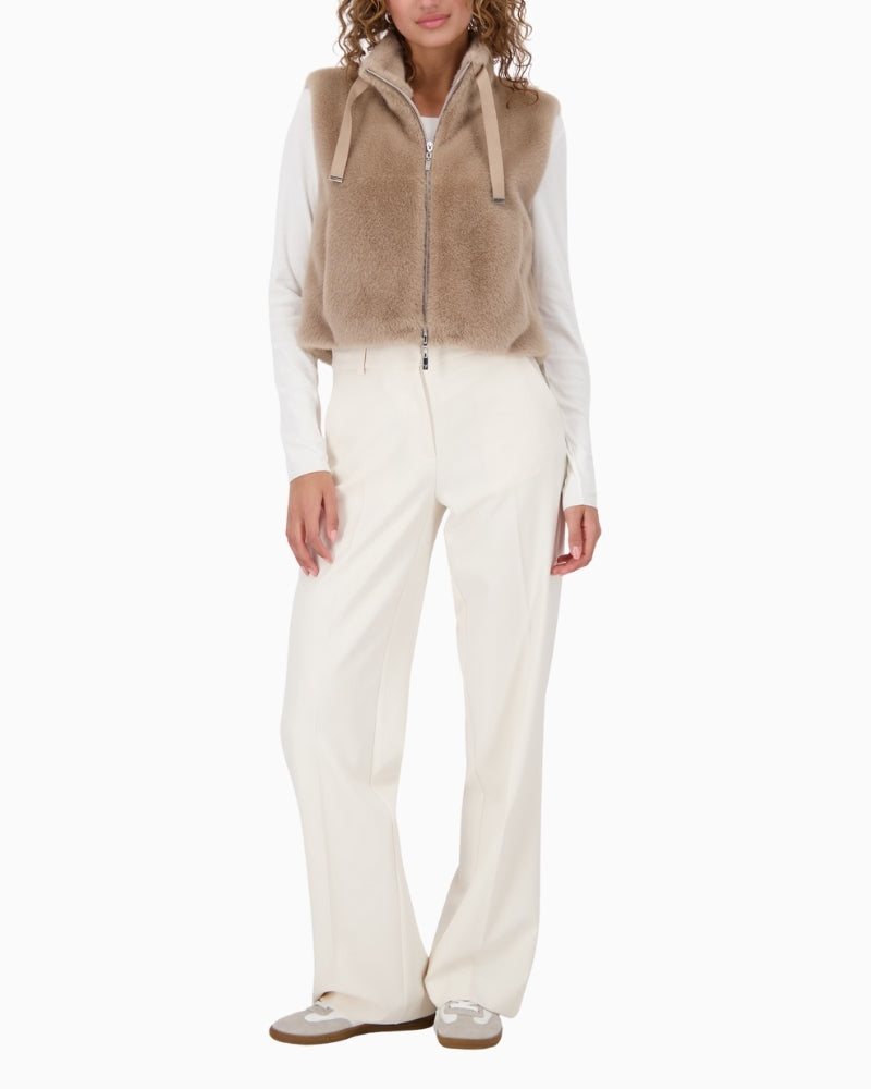 Cosy sleeveless jacket by Monari with soft faux fur finish and practical side pockets