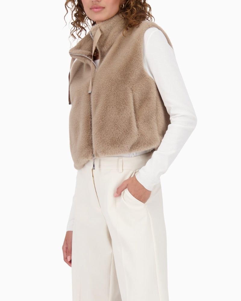 Sleeveless faux fur vest by Monari with stand-up collar and soft fluffy texture