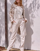 Front view of Monari faux suede trousers with straight-leg and side pockets