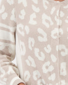 Close-up of textured knit and soft neutral tones