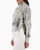 Side view of Monari knit jumper with side slits and slightly longer back