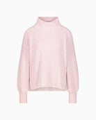 Woman wearing Monari rose knit pullover front view with stand-up collar – Áines Boutique