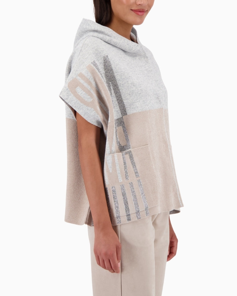 Side view of relaxed-fit cape with soft drape and open front