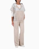 Elegant knitted cape by Monari for layering in cool weather