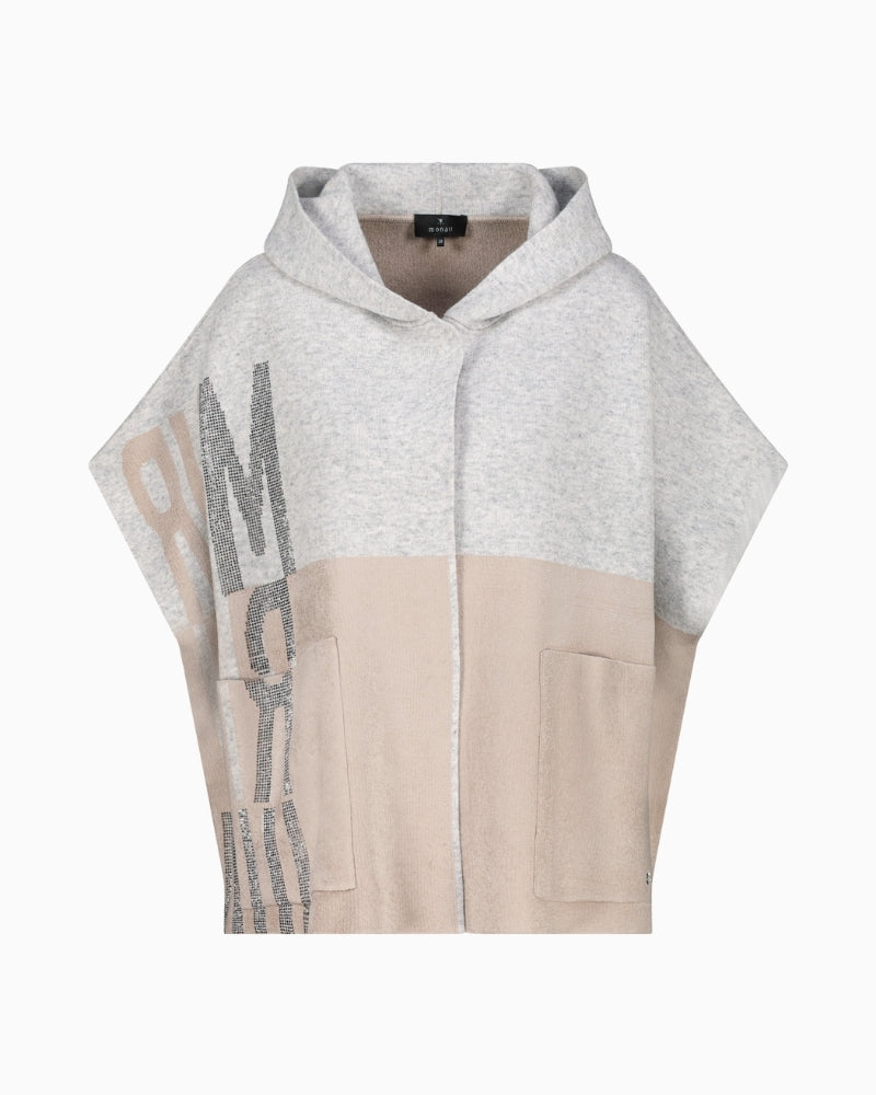 Front view of wool blend cape in tonal grey panels