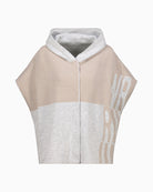 Front view of wool blend cape in tonal grey panels